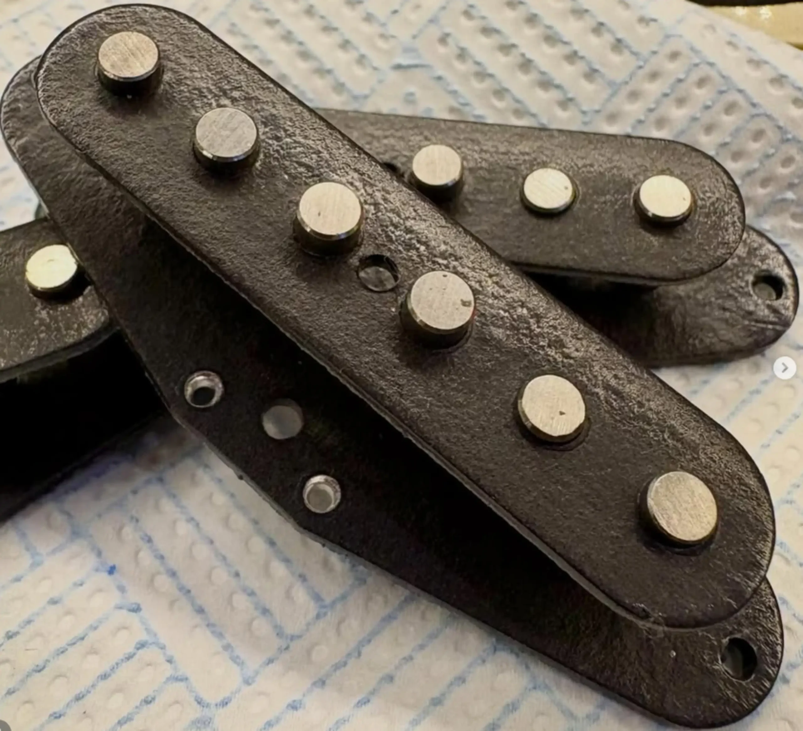 Mojo Pickups, Die Pressed and Lacquer dipped bobbins.